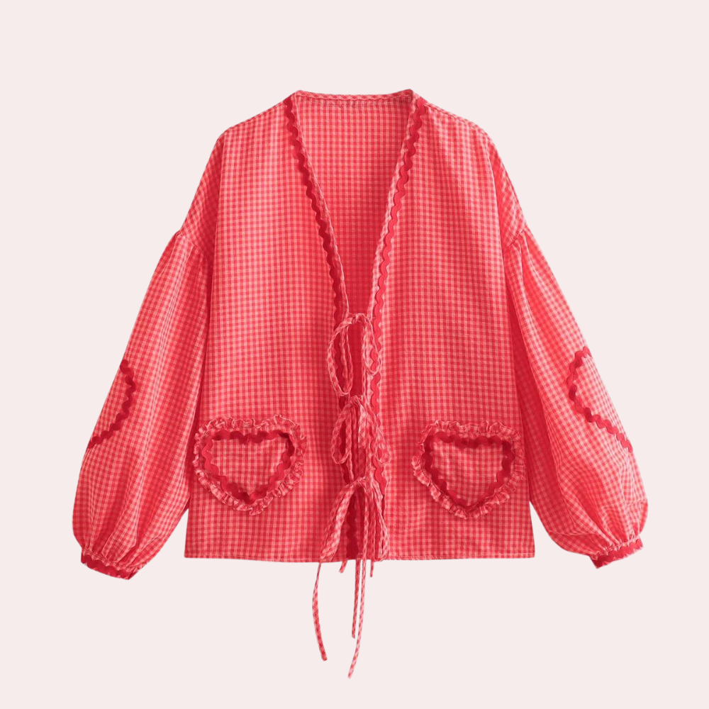 "Roze dames top met hartjesapplicatie en korte mouwen, comfortabele pasvorm ideaal voor casual outfits."