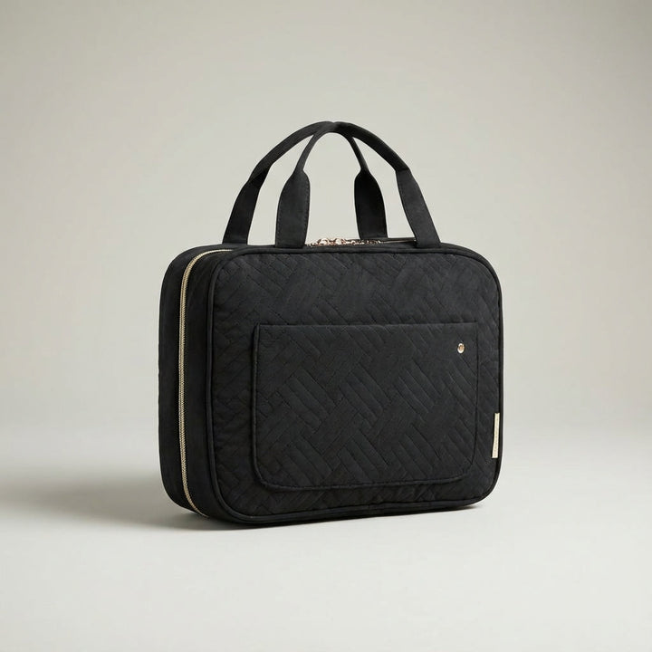Compacte Neatmate reistas in het roze, perfect voor een georganiseerde vakantie met je essentials.