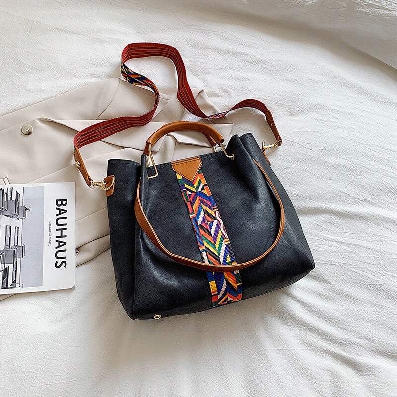 Duurzame PU leren schoudertas voor dames, een ruime tote bag. Perfect voor dagelijks gebruik en vrouwenmode.