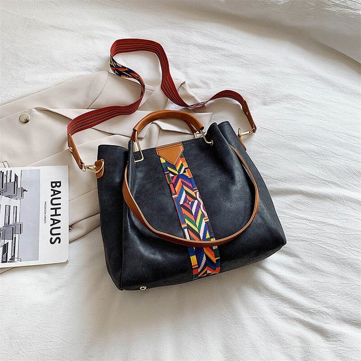 Duurzame PU leren schoudertas voor dames, een ruime tote bag. Perfect voor dagelijks gebruik en vrouwenmode.