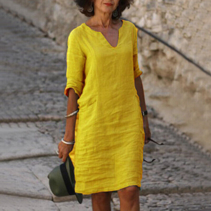 Moderne, comfortabele dames midi jurk, luchtig en veelzijdig, perfect als elegante zomerjurk of strandjurk.