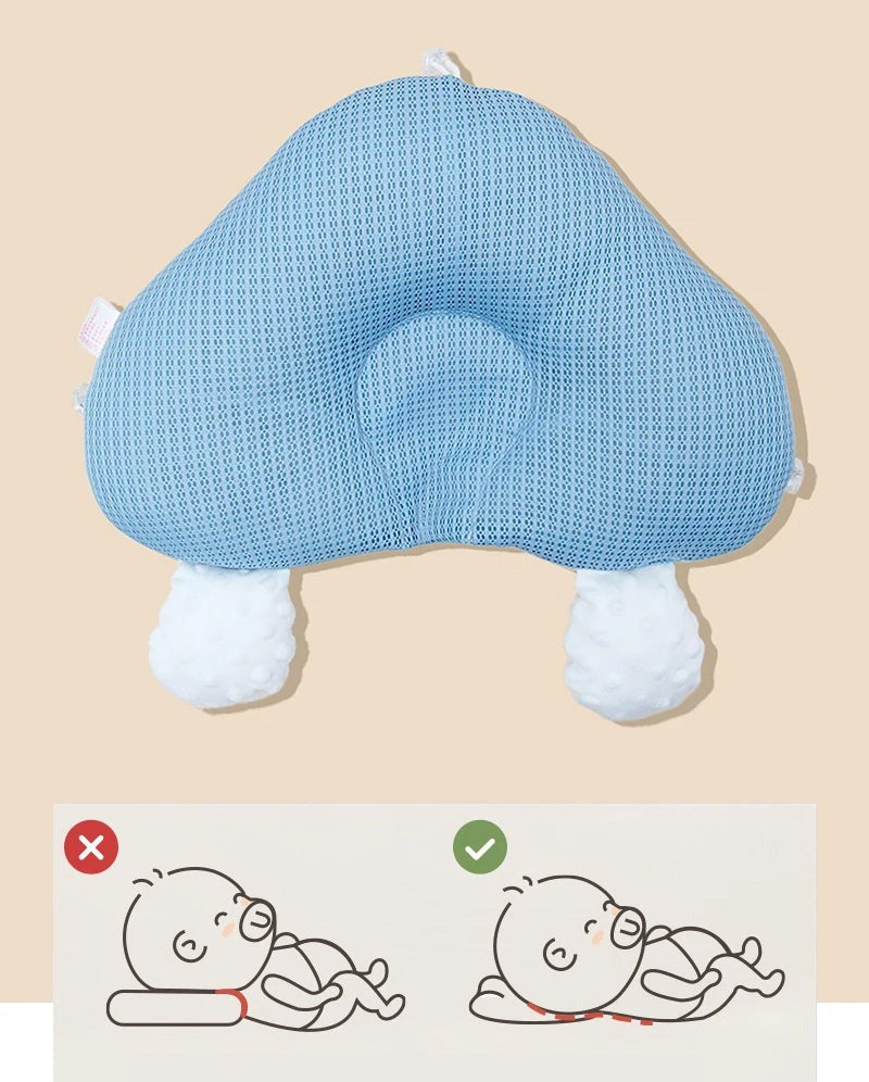 Detail van ergonomisch baby slaapkussen. Bevordert natuurlijke, veilige slaaphouding pasgeborene.