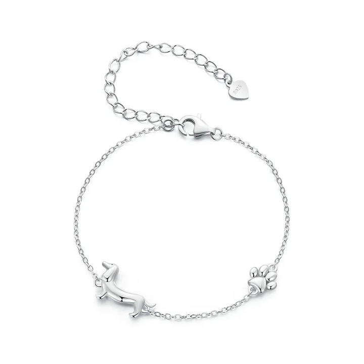 Schattige zilveren dames teckel bedelarmband, verstelbaar, perfect cadeau voor hondenliefhebbers.
