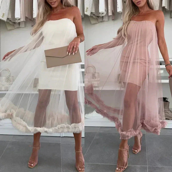 Elegante dames avondjurk Nea, schoudervrij met tule en verfijnde ruches. Ideaal als cocktailjurk.
