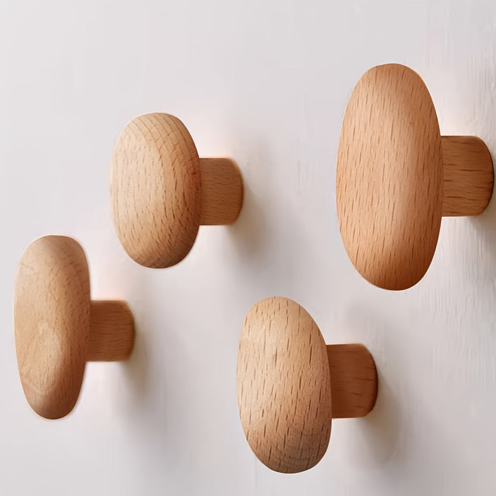 Diverse maten houten wandhaken set, handgemaakt van beuken- en notenhout. Functionele interieur decoratie thuis.