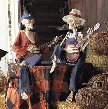 Halloween SkullGroove decoratie: twee animerende skeletten met LED verlichting en geluid.