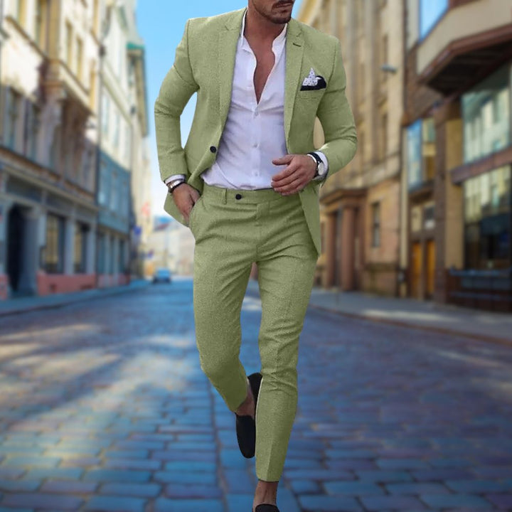 "Slim fit heren zomerpak voor bruiloften, elegant grijs met subtiele stiksels, perfecte pasvorm en ademend materiaal."