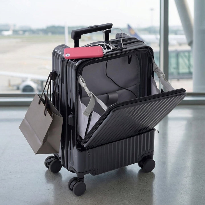 Slimme handbagage koffer met voorvak en USB-poort voor snel opladen, ideaal voor georganiseerd reizen.