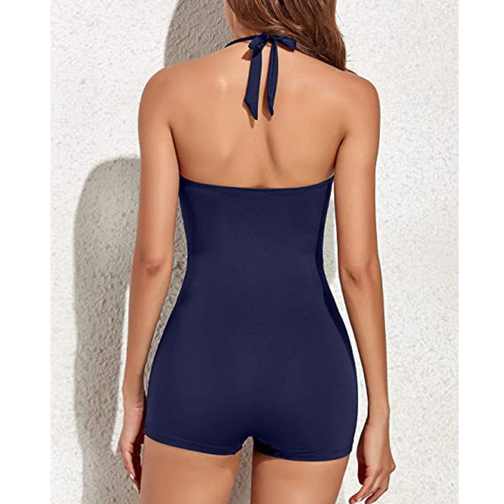"Sneldrogend sportief badpak met boyleg design, flatterende pasvorm, donkerblauw met subtiele stiksels, ideaal voor zomer."