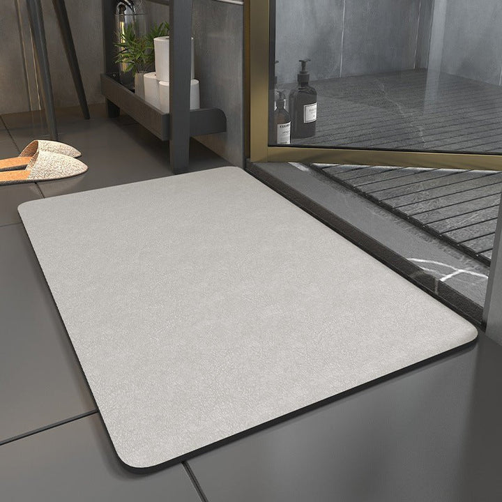 Hygiënische en sneldrogende antislip badmat van DryStep. Voorkomt uitglijden en houdt de badkamervloer schoon.