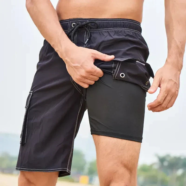 Sneldrogende heren sportshorts Jaxon, ideaal voor fitness, zwemmen en strand. Comfortabele korte broek voor actieve zomerdagen.