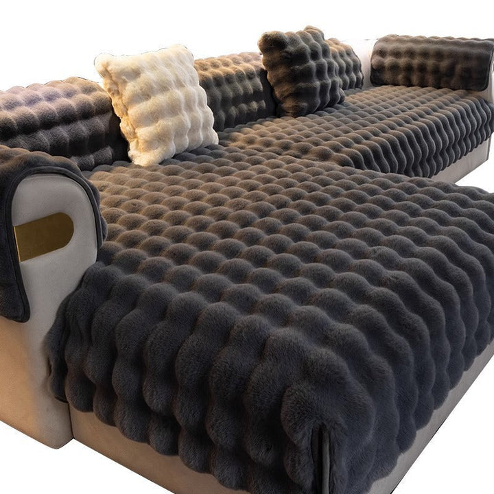 Detail van de antislip onderzijde van de bankhoes, garandeert dat de hoes perfect op zijn plaats blijft. Optimale pasvorm.