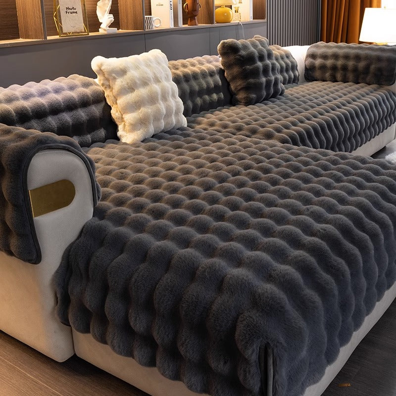 Comfortabele bankhoes in moderne woonkamer, creëert een uitnodigende sfeer. Luxe en praktisch in één product.