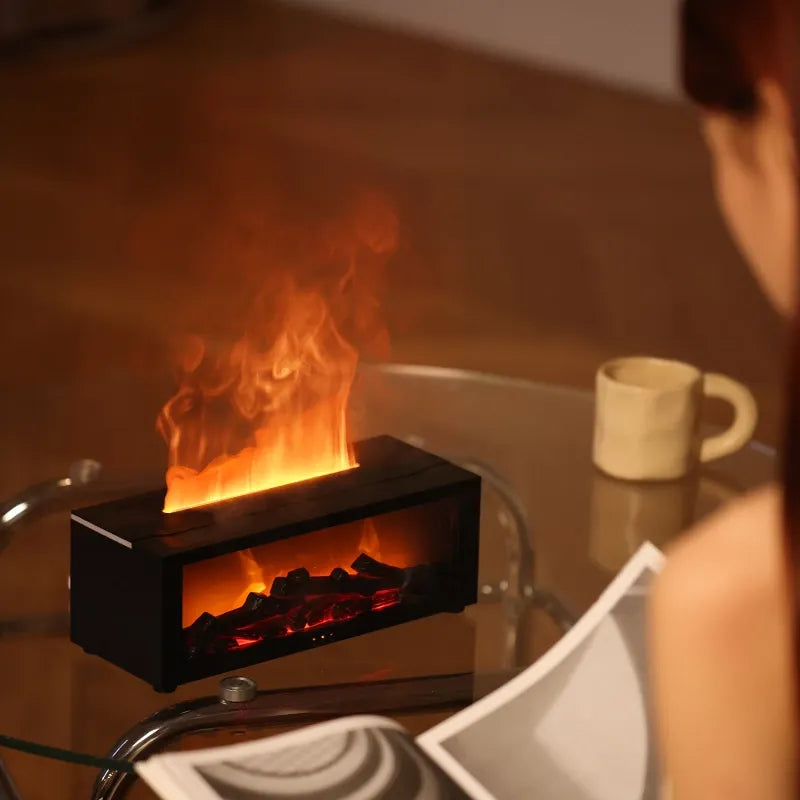 Rustgevende sfeerlamp en diffuser met haardvuur simulatie; creëert een kalme, ontspannen sfeer in huis.