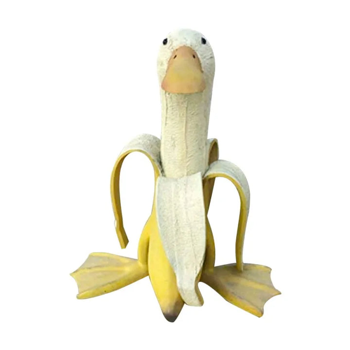 Banaan-eend figuur, een unieke harsdecoratie die humor toevoegt aan elke binnen- of buitenruimte.