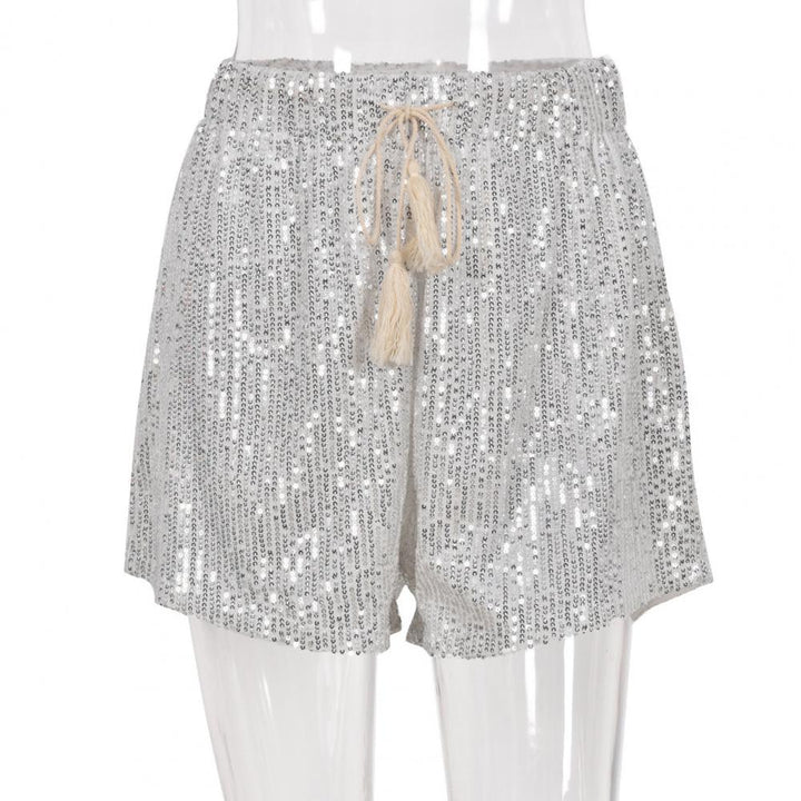 Fashionable dames glitterbroek, zilverkleurig en sprankelend, een statement piece voor elke outfit.