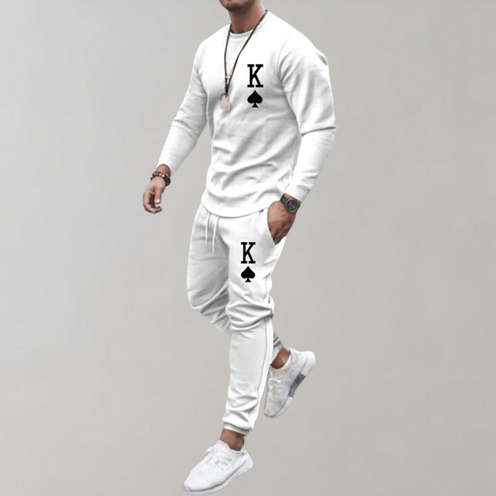 "Stijlvol en comfortabel heren trainingspak, slim-fit met ritssluiting, verkrijgbaar in groen, zwart, khaki en wit."