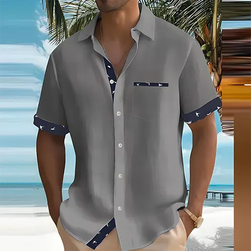 Modieus herenhemd met korte mouwen, perfect voor de zomer. Comfortabel, ademend en veelzijdig voor elke man.
