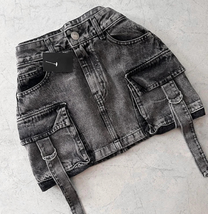 "Stijlvolle A-lijn denim rok voor dames, effen blauwe kleur met zakken voor tijdloze en praktische uitstraling."