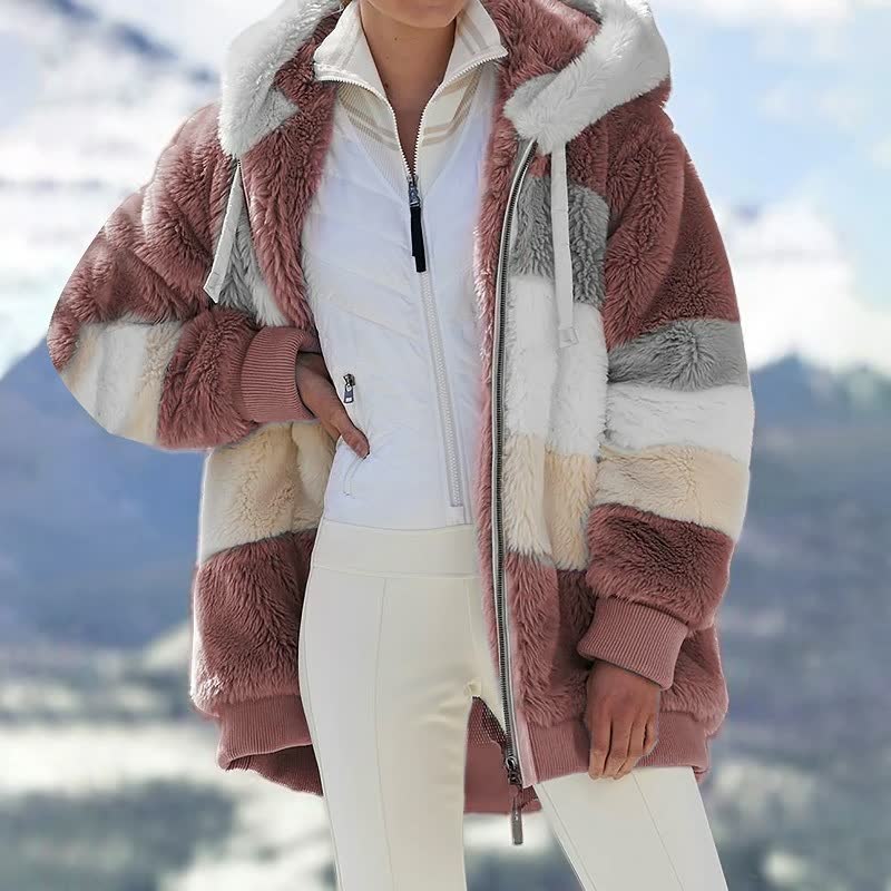Stijlvolle, comfortabele dames winterjas. Warme oversized jas voor de koude winterdagen.
