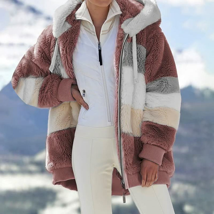Stijlvolle, comfortabele dames winterjas. Warme oversized jas voor de koude winterdagen.