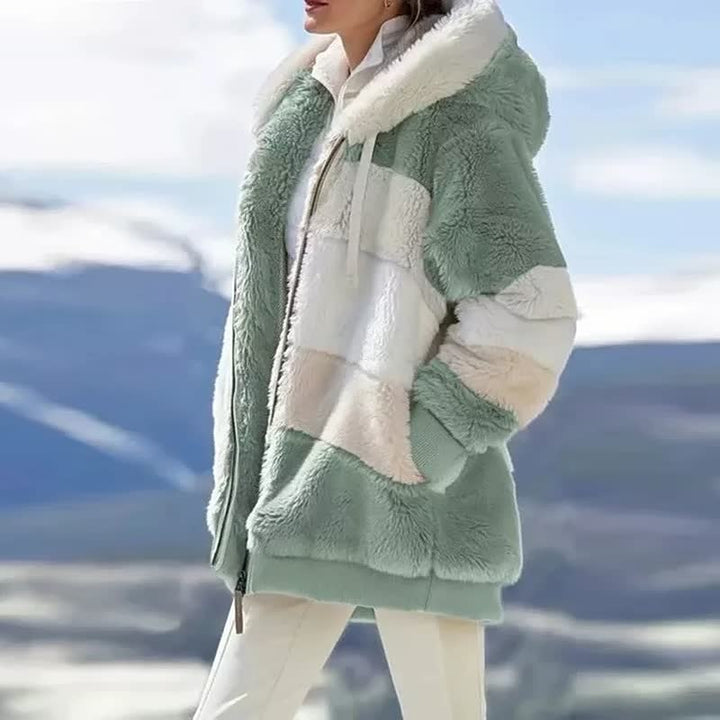 Veelzijdige dames winterjas in effen kleur. Comfortabel en stijlvol voor elke gelegenheid.