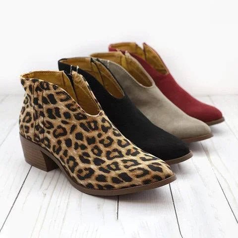 Grijze dames enkellaarsjes met zijrits, comfortabele blokhak en stijlvol design, ideaal voor de najaarsmode.