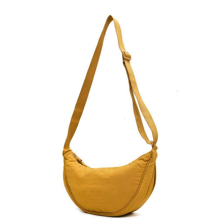 Dames halve maan crossbody, tijdloos design dat nooit uit de mode raakt.