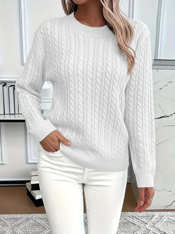Trendy dames kabeltrui met ronde hals, een tijdloos kledingstuk dat comfort en mode perfect combineert.