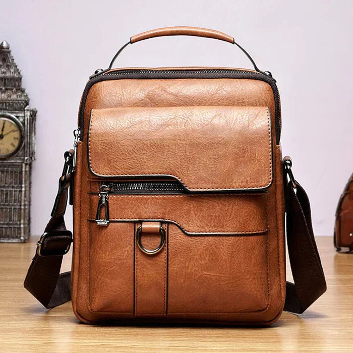 Bruine leren schoudertas voor dames, praktisch en elegant als handtas of crossbody.