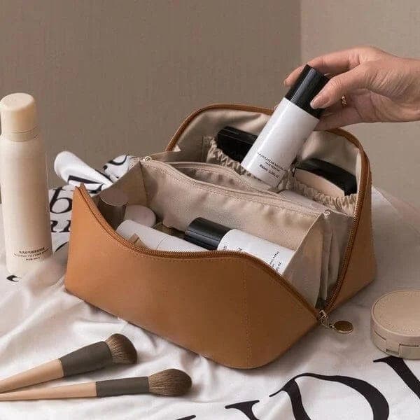 Dames beauty bag met ritssluiting, handig voor het georganiseerd opbergen van make-up en accessoires.
