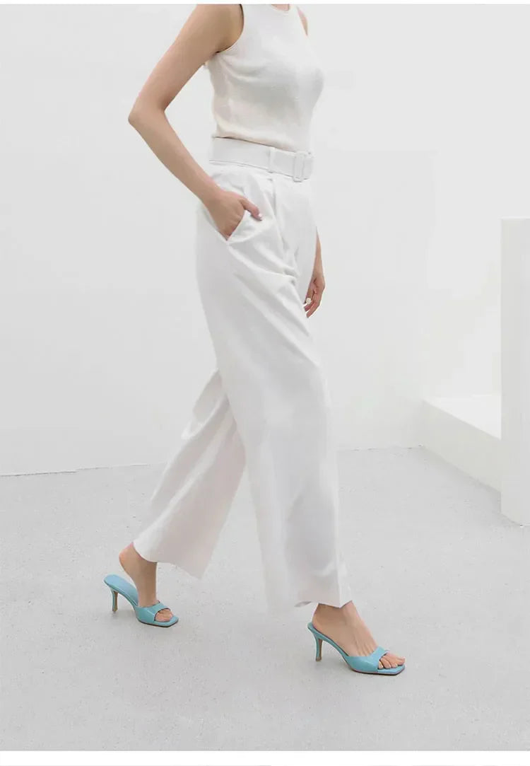 Chique bruine dames open hak-mules. Stijlvolle en comfortabele instappers, ideaal voor een elegante look.