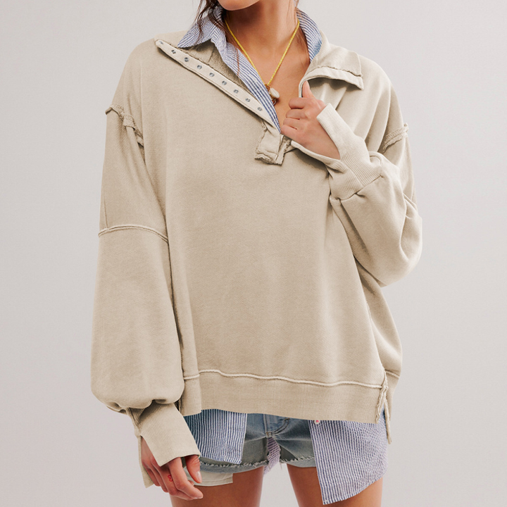 Moderne dames oversized pullover met Henley halslijn, ideaal als comfortabele damestop voor alle seizoenen.