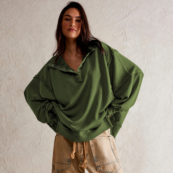 Trendy dames trui: oversized pullover met elegante Henley halslijn. Perfect voor een relaxte, stijlvolle look.