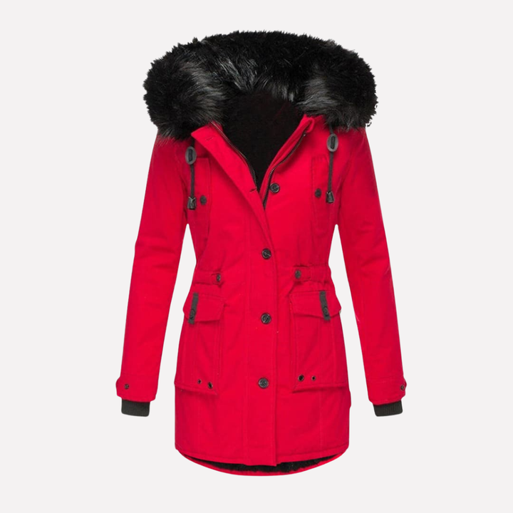 Trendy dames parka winterjas met een robuuste capuchon en praktische flapzakken, essentieel voor outdoor fashion.