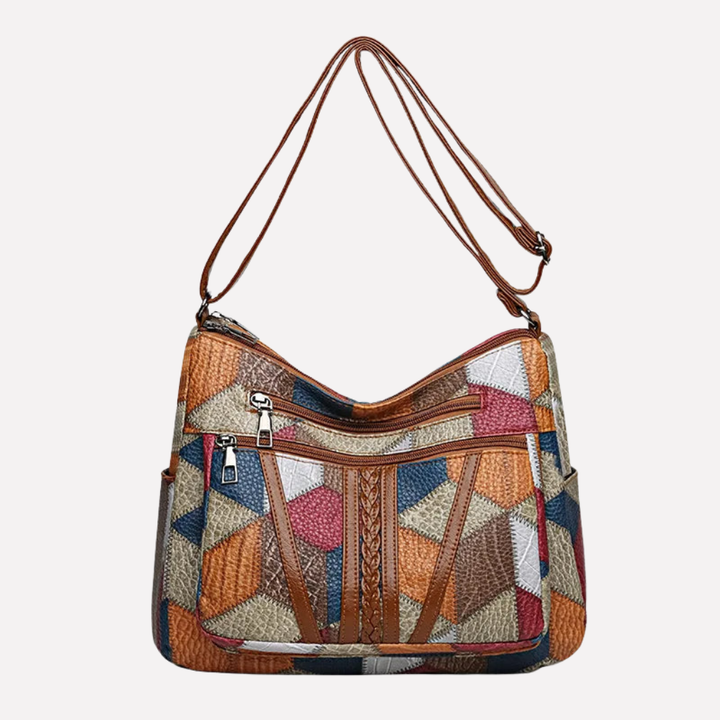 Stijlvolle dames patchwork handtas, ideaal voor dagelijks gebruik. Met gestructureerd design & organizerfuncties.