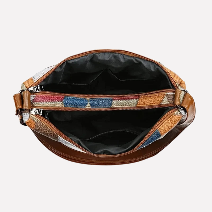 Grote patchwork dameshandtas met meerdere vakken; een praktische organizer tas & reistas voor al je essentials.