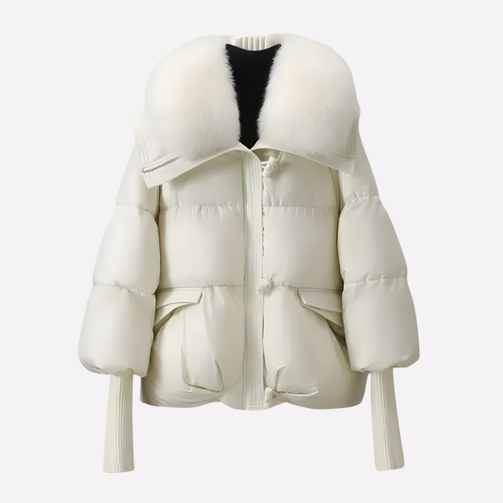 Comfortabele gewatteerde dames winterjas met elegante faux fur kraag. Ideaal als casual bovenkleding voor koude dagen.