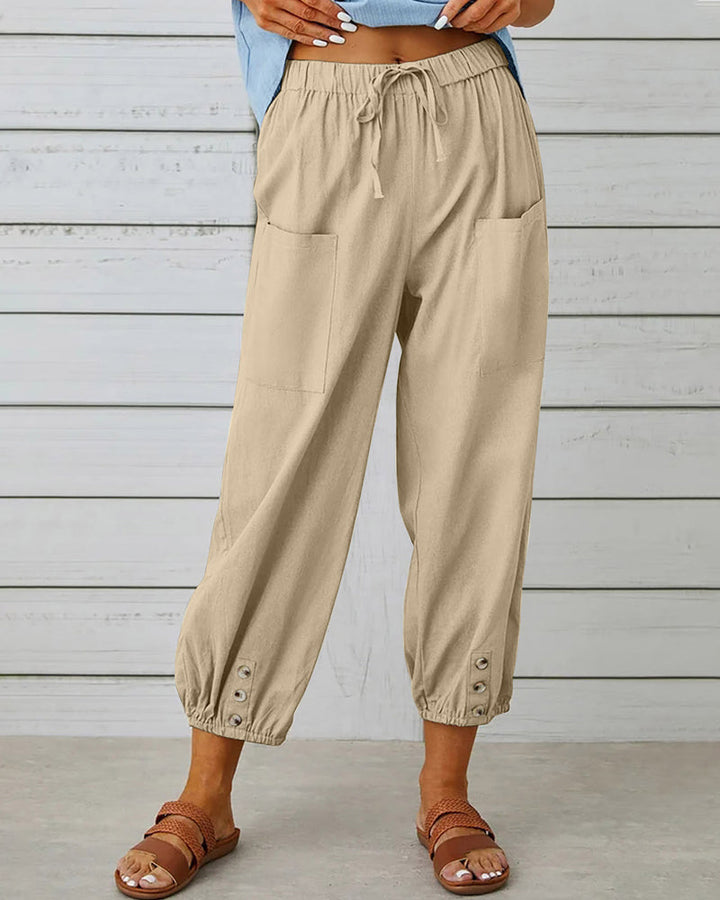Elegante hooggetailleerde damesbroek met wijde pijpen. Combineer comfort met een tijdloze, stijlvolle uitstraling.