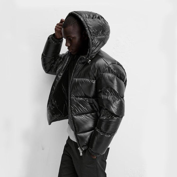 "Stijlvolle effen pufferjas voor mannen, strak minimalistisch design, comfortabele pasvorm en zijzakken, ideaal voor winterda