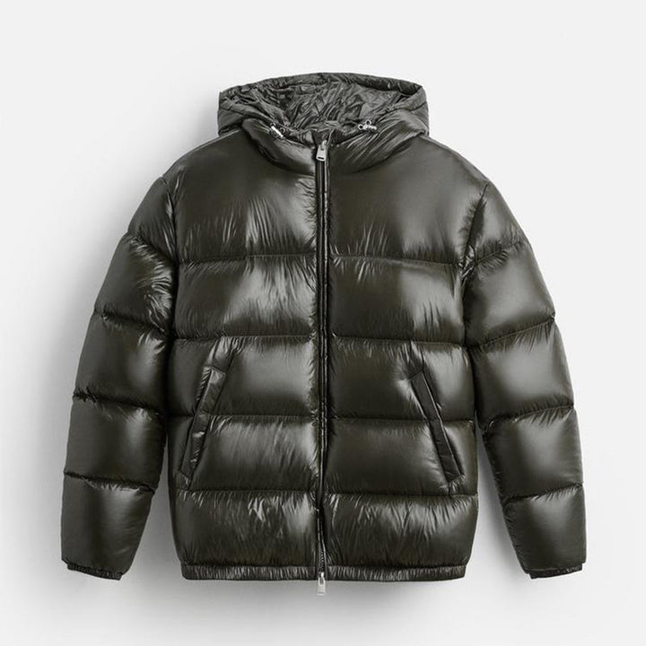 "Stijlvolle effen pufferjas voor mannen, strak minimalistisch design, comfortabele pasvorm en zijzakken, ideaal voor winterda