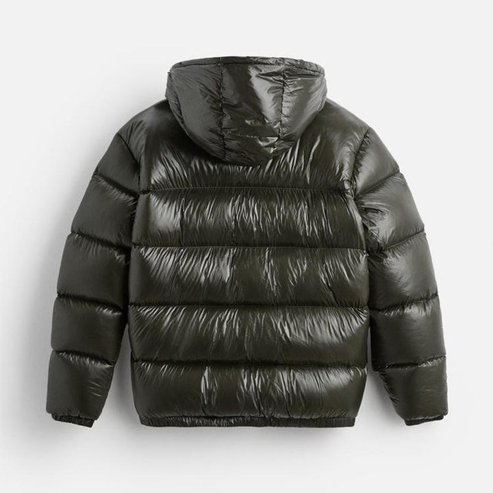 "Stijlvolle effen pufferjas voor mannen, strak minimalistisch design, comfortabele pasvorm en zijzakken, ideaal voor winterda