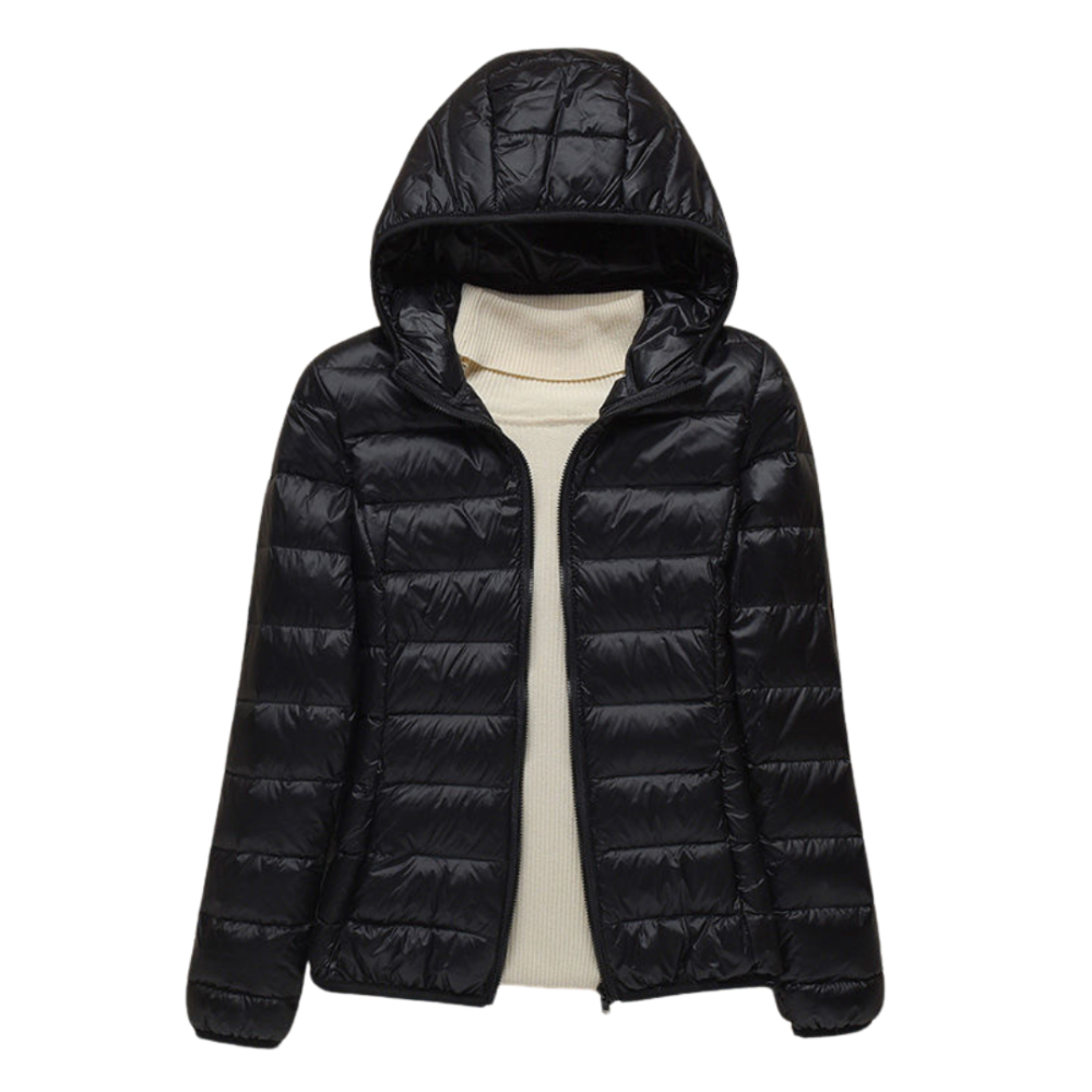 Stijlvolle gewatteerde damesjas met capuchon, perfect voor lente, herfst en milde winters. Comfortabel en veelzijdig.