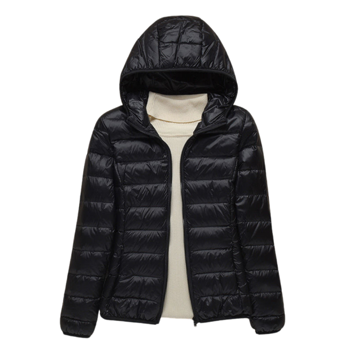 Stijlvolle gewatteerde damesjas met capuchon, perfect voor lente, herfst en milde winters. Comfortabel en veelzijdig.