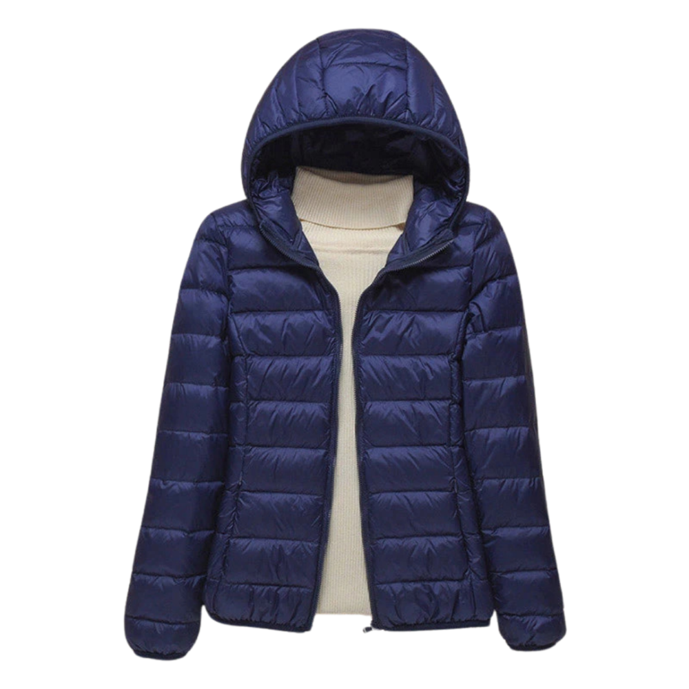 Vrouwelijke gewatteerde damesjas met capuchon. Een stijlvolle en comfortabele buitenkleding voor elk seizoen.