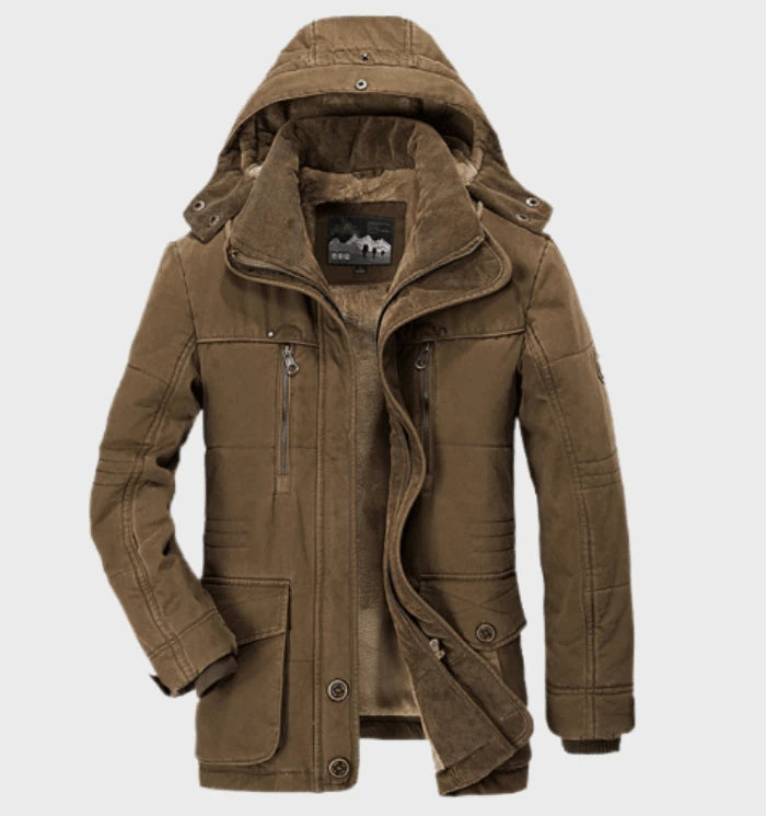 Robuuste heren cargo jas met capuchon, functionele zakken en halflang ontwerp. Perfecte outdoor jas.
