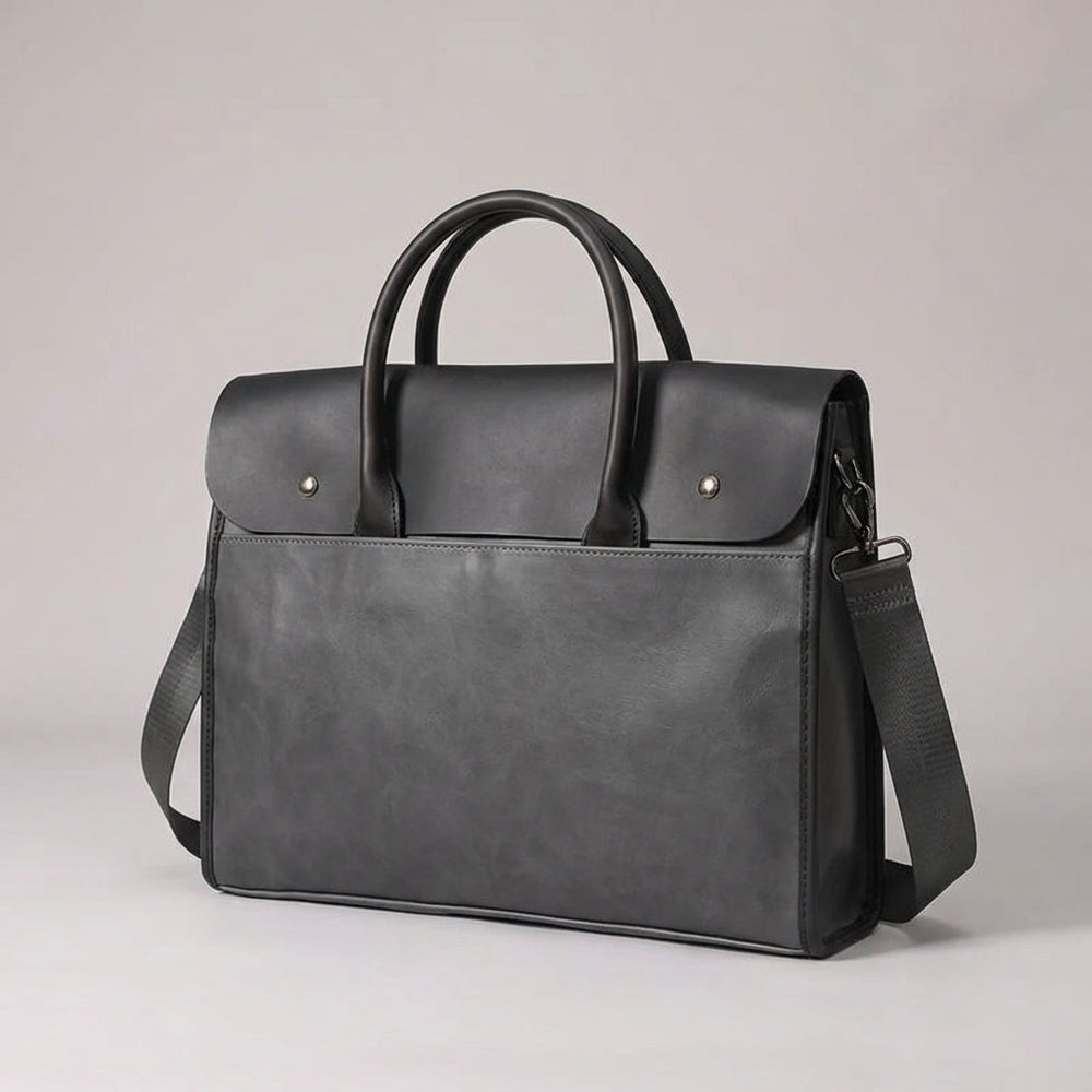 Georganiseerde RetroCarry heren werktas met meerdere vakken en laptopvak voor 14 inch, perfect voor documenten en accessoires.