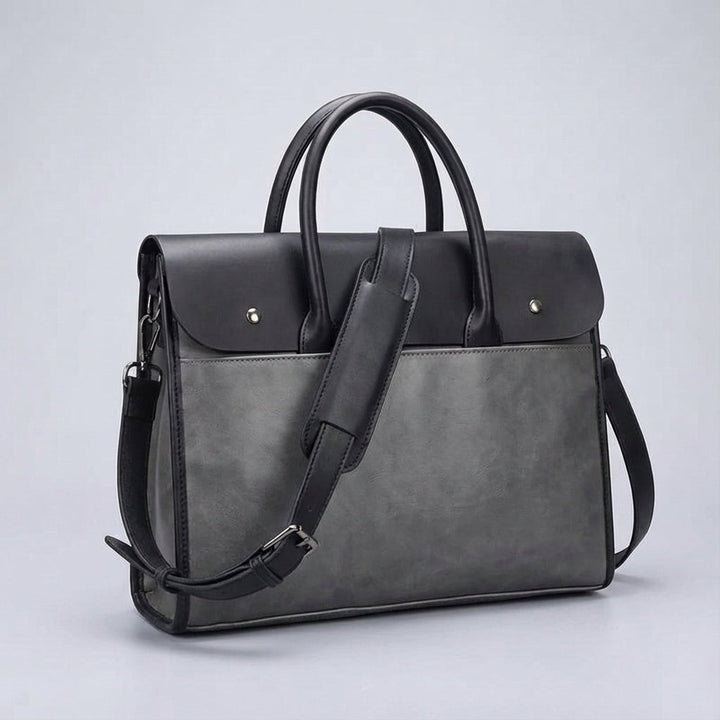 Veelzijdige heren reistas/laptoptas (RetroCarry) van PU leer voor dagelijks gebruik, werk of korte trips. Geschikt voor 14 inch laptop.