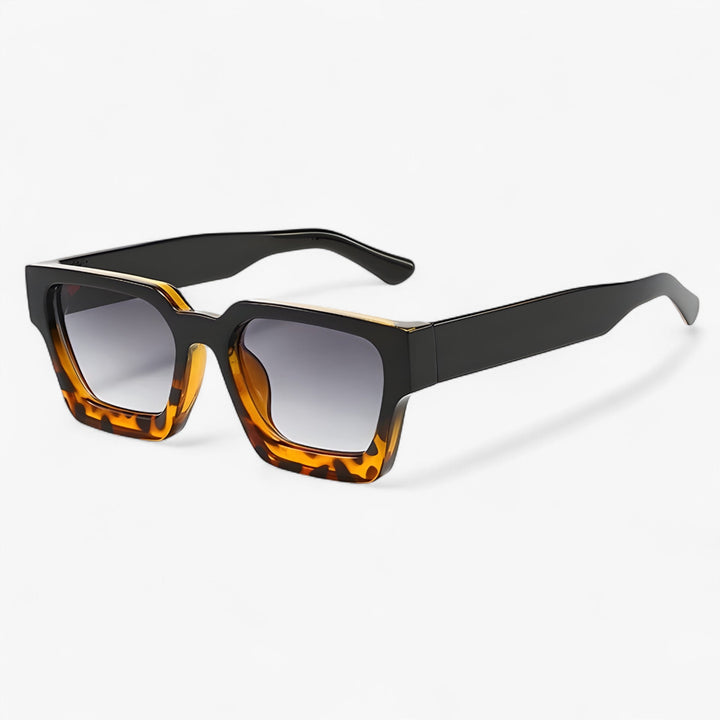 Perfecte heren retro zonnebril. Vierkant model voor een stoere look en complete UV400 bescherming.
