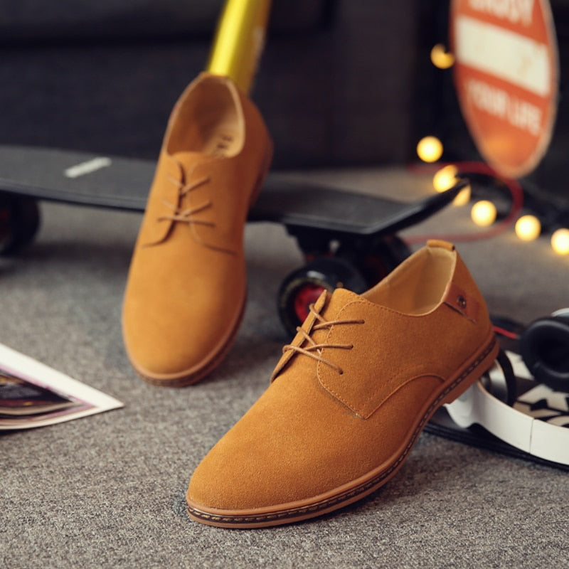 Collectie van Otto Oxford herenschoenen in verschillende kleuren: zwart, bruin en blauw.